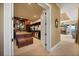 Large walk-in closet featuring custom built-ins, shelving, and center island for optimal storage at 1112 Orange Ave, Winter Springs, FL 32708