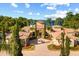 Stately home with circular driveway, fountain, and manicured landscaping, offering a luxurious and inviting curb appeal at 1112 Orange Ave, Winter Springs, FL 32708