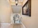 Hallway boasts stylish decor and elegant lighting fixtures at 1112 Orange Ave, Winter Springs, FL 32708