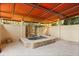 An inviting outdoor hot tub features a fountain and a retractable awning at 1112 Orange Ave, Winter Springs, FL 32708