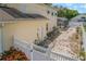 View of the property's backyard with access to the screened pool and home at 1188 Foxforrest Cir, Apopka, FL 32712