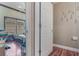 This bedroom has wood floors and a large window at 1188 Foxforrest Cir, Apopka, FL 32712