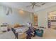 Bedroom features include a ceiling fan and an ensuite bathroom at 1188 Foxforrest Cir, Apopka, FL 32712