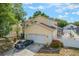 Charming two-story home with a well-maintained lawn, two car garage, and a lovely garden at 1188 Foxforrest Cir, Apopka, FL 32712