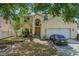 Charming two-story home featuring a well-manicured lawn and attached two-car garage at 1188 Foxforrest Cir, Apopka, FL 32712