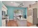An open kitchen with a central island, stainless steel appliances, and a sliding door to the screened patio at 1188 Foxforrest Cir, Apopka, FL 32712