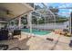 Relax by the screened pool with covered patio, great for entertaining guests and enjoying the outdoors at 1188 Foxforrest Cir, Apopka, FL 32712
