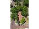 Aerial view of the home and neighborhood featuring a red brick road and mature landscaping at 1236 Illinois St, Orlando, FL 32803