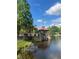 Exterior lake view of the community gazebo by the water at 12539 Floridays Resort Dr Dr # 208D, Orlando, FL 32821