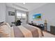 Bedroom with carpet flooring, window and flat screen television at 13543 Abberwick Dr, Orlando, FL 32832