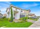Charming two-story home with stucco exterior, tiled roof, and well-maintained landscaping at 13543 Abberwick Dr, Orlando, FL 32832
