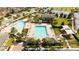 Aerial view of community pool, playground, and recreation center, perfect for Gathering fun at 13543 Abberwick Dr, Orlando, FL 32832