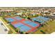Aerial view of community tennis and basketball courts, a great amenity for active residents at 13543 Abberwick Dr, Orlando, FL 32832