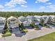 A residential street view with lush trees showing beautiful suburban homes at 1449 Fairview Cir, Reunion, FL 34747