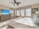 Bedroom with a king bed, television and ceiling fan at 1449 Fairview Cir, Reunion, FL 34747