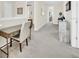 Second floor hallway with a desk nook and decorative furnishings at 1449 Fairview Cir, Reunion, FL 34747