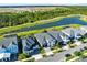 Panoramic aerial view showcasing the homes located on the water and throughout the neighborhood at 14749 Walcott Ave, Orlando, FL 32827