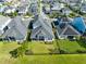 Aerial view of a home with a well-maintained backyard and neighborhood at 14749 Walcott Ave, Orlando, FL 32827
