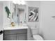 Charming bathroom with updated vanity, whimsical décor, and modern fixtures, perfect for a stylish powder room at 14749 Walcott Ave, Orlando, FL 32827