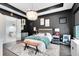 Stylish bedroom with a dark ceiling and statement chandelier at 14749 Walcott Ave, Orlando, FL 32827