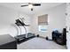 Simple exercise room with treadmill and workout equipment at 14749 Walcott Ave, Orlando, FL 32827