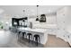 Beautiful kitchen with a large center island, white cabinetry, and adjacent dining area at 14749 Walcott Ave, Orlando, FL 32827