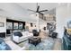Spacious living room showcases an open floor plan, high ceilings, and seamless flow to the kitchen at 14749 Walcott Ave, Orlando, FL 32827