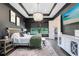 Stylish main bedroom with ample natural light, elegant decor, and en-suite bathroom at 14749 Walcott Ave, Orlando, FL 32827