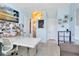 Bright office featuring a large work space, modern light fixture, and a cozy seating area at 14749 Walcott Ave, Orlando, FL 32827