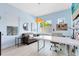 Bright home office with large windows, modern desk, and comfortable seating, perfect for productivity at 14749 Walcott Ave, Orlando, FL 32827