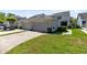 Exterior of the house shows garage, lawn and drive way at 14751 Clarkson Dr, Orlando, FL 32828