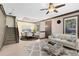 Open-concept living room provides staircase access and a dining area for entertaining guests at 14751 Clarkson Dr, Orlando, FL 32828