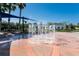 Community splash pad with picnic tables and sunshades for Gathering fun on a sunny day at 14751 Clarkson Dr, Orlando, FL 32828