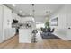 Bright kitchen with stainless appliances, breakfast bar, and adjacent dining area at 1620 Haddock St, St Cloud, FL 34771