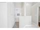 Contemporary bathroom with rainfall shower head and marble-look tiling at 1631 Oak Hill Trl, Kissimmee, FL 34747