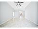 Open-concept living area with neutral walls and tile flooring offers versatile living and entertaining at 1631 Oak Hill Trl, Kissimmee, FL 34747