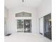 Covered patio offers seamless indoor-outdoor living with large sliding doors and ample natural light at 1631 Oak Hill Trl, Kissimmee, FL 34747