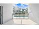 View of the screened-in pool and patio area at 1631 Oak Hill Trl, Kissimmee, FL 34747