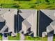 New construction homes with green lawns in a neat neighborhood at 19065 Blueleaf St, Orlando, FL 32827