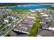 New home community by a blue lake features a pool and playground at 19065 Blueleaf St, Orlando, FL 32827