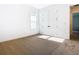 This bedroom offers natural light, neutral carpet, closet, and white trim at 19065 Blueleaf St, Orlando, FL 32827
