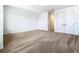 Neutral bedroom with light carpeting and white walls and trim at 19065 Blueleaf St, Orlando, FL 32827