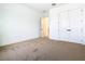 This bedroom offers natural light, neutral carpet, closet, and white trim at 19065 Blueleaf St, Orlando, FL 32827