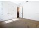 This bedroom offers natural light, neutral carpet, closet, and white trim at 19065 Blueleaf St, Orlando, FL 32827