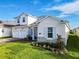 Charming two-story home featuring a three-car garage, beautiful stone accents, and a well-manicured lawn at 19065 Blueleaf St, Orlando, FL 32827