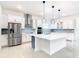 Well-appointed kitchen with stainless steel appliances and a spacious center island at 19065 Blueleaf St, Orlando, FL 32827