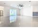 Bright living area with sliding glass doors leading to the outdoors, creating a seamless indoor-outdoor flow at 19065 Blueleaf St, Orlando, FL 32827