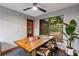 Dining room featuring a wooden table with a view of the exterior at 2114 Bluff Oak St, Apopka, FL 32712