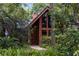 Charming home featuring a unique architectural design nestled in a lush, verdant landscape at 2114 Bluff Oak St, Apopka, FL 32712