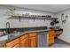 Kitchen featuring wood cabinets, granite countertops, and stainless steel appliances at 2114 Bluff Oak St, Apopka, FL 32712